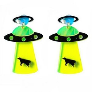 Hand crafted alien abduction cow earrings